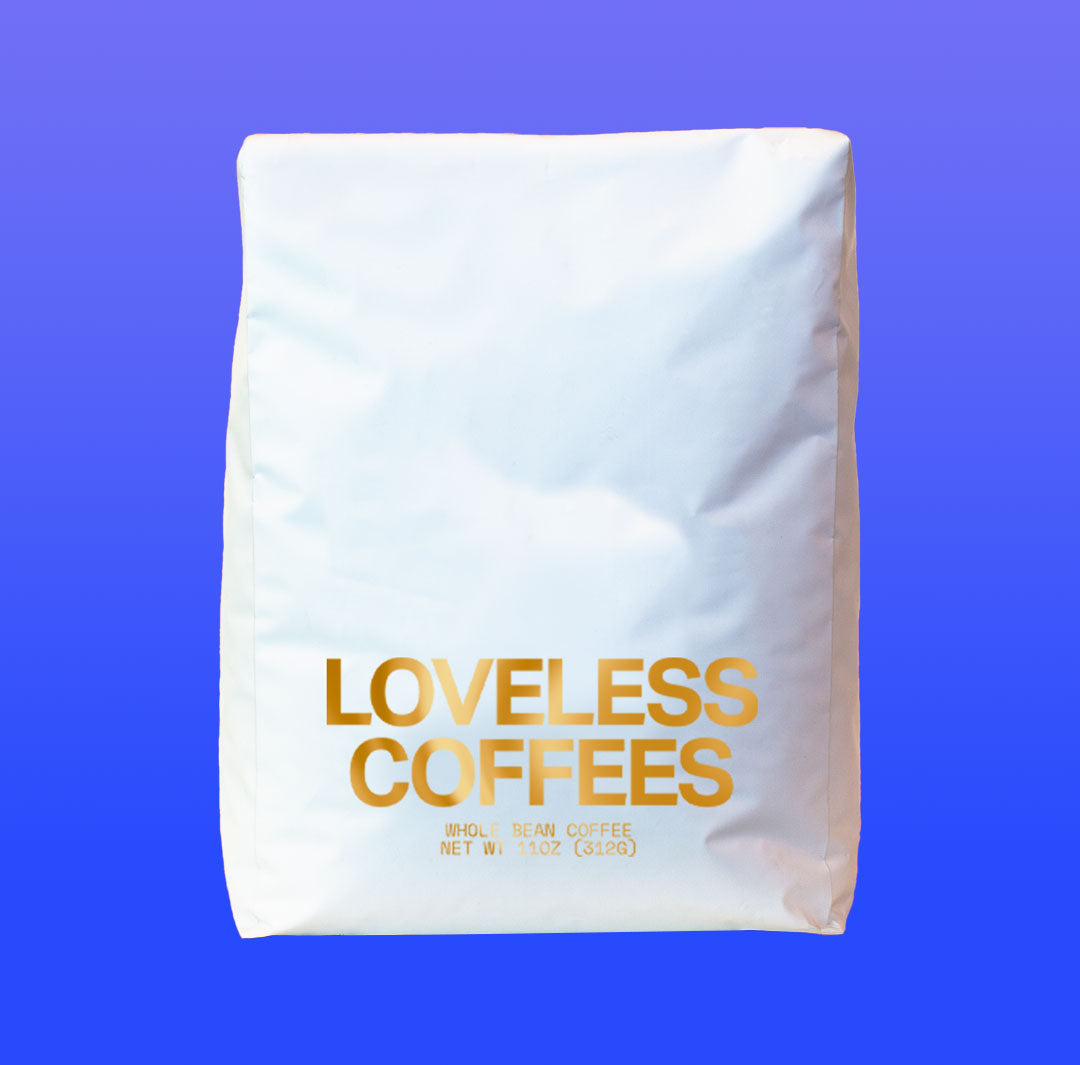 A white 5lb bag of coffee roasted by Loveless Coffees