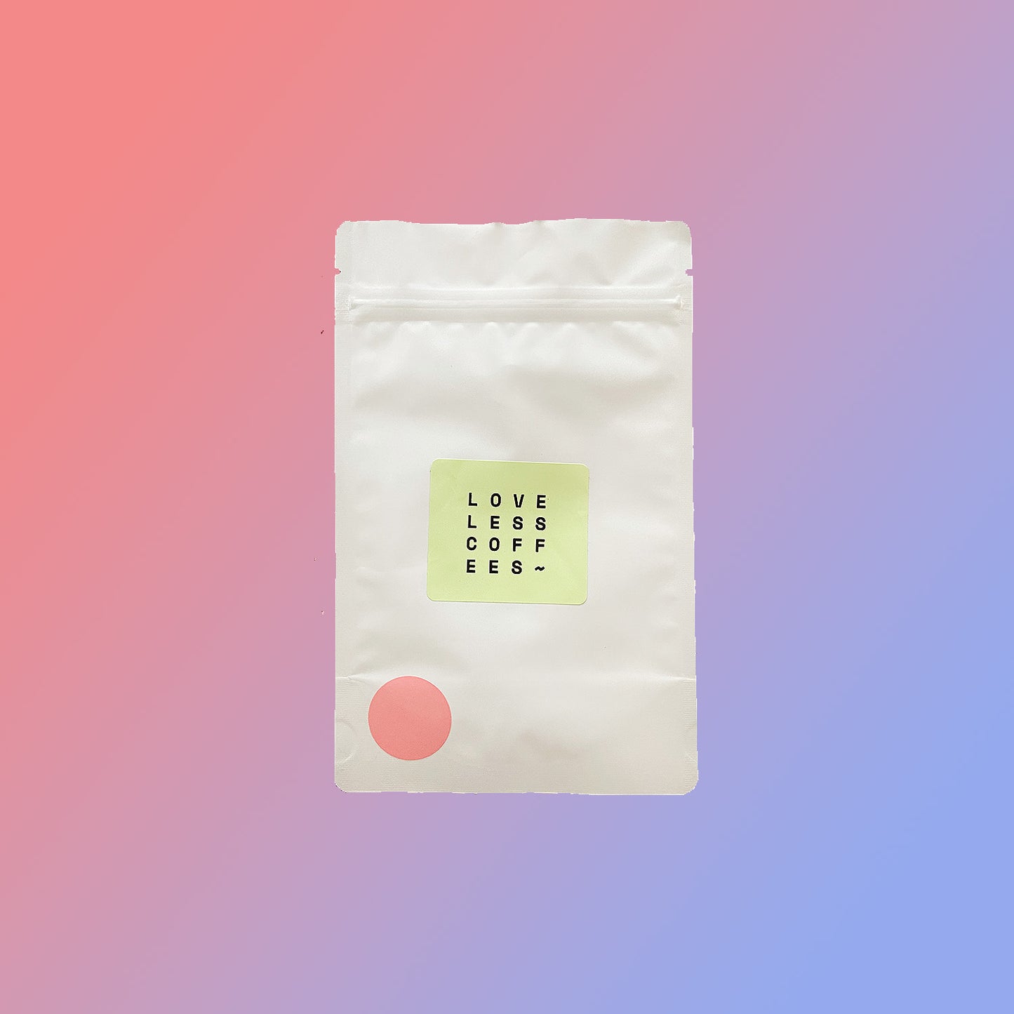 A white 2.5oz bag of coffee roasted by Loveless